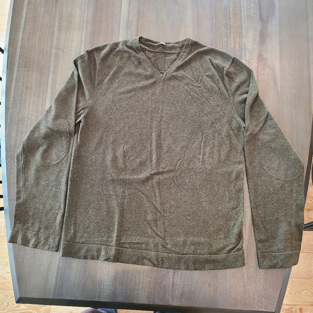Light green V-neck sweater by Tristan. Size M